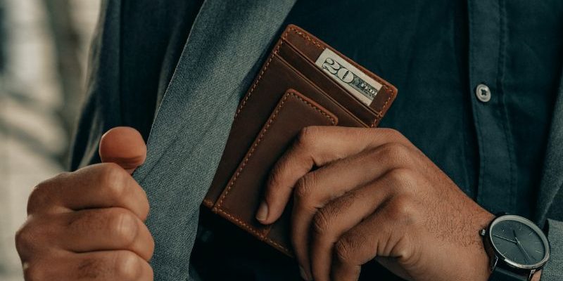 man holding wallet